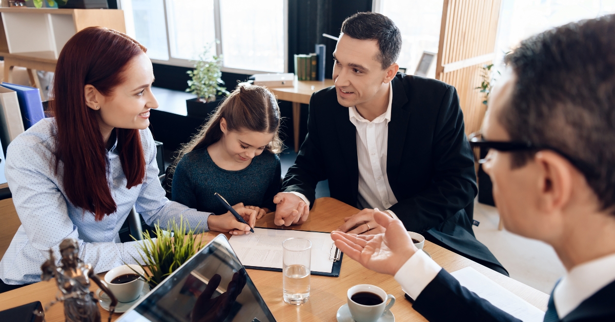 lawyer shows mother where to sign 