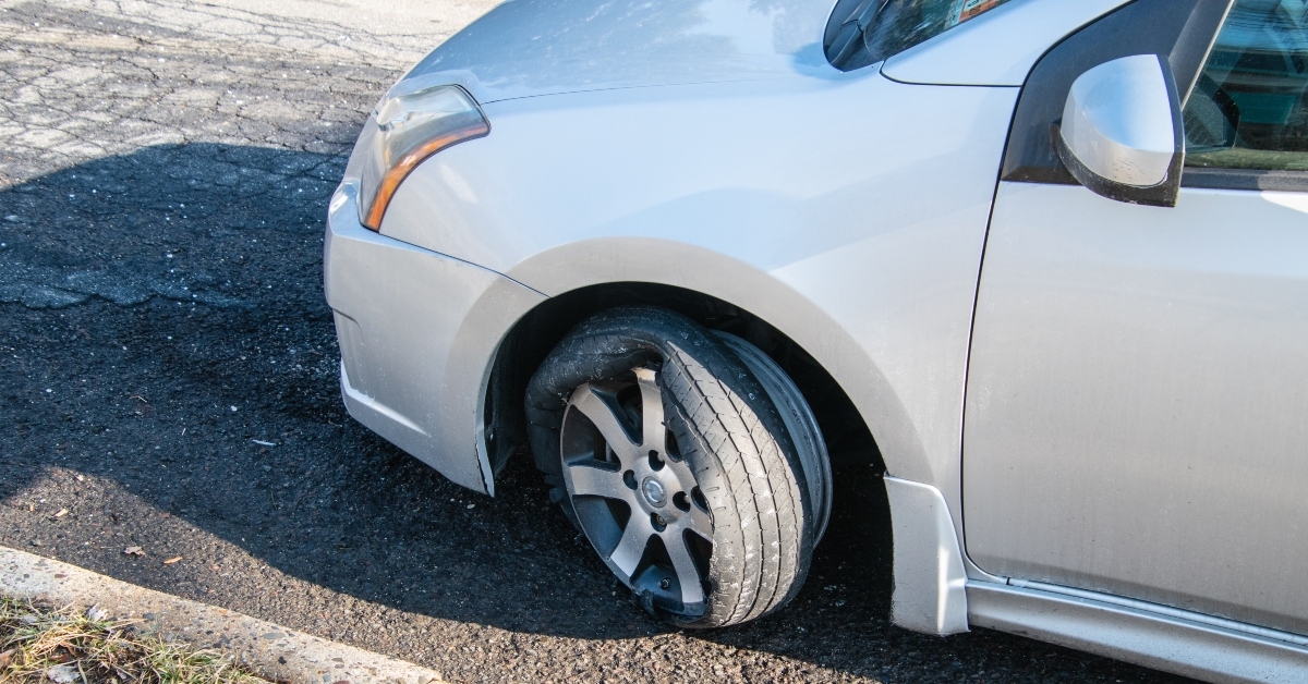 car tire that has a blowout 
