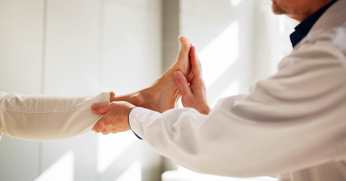 Physiotherapist Doing Acupuncture Treatment