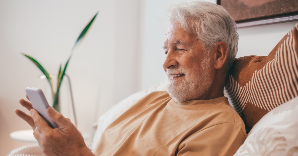 Older man using phone