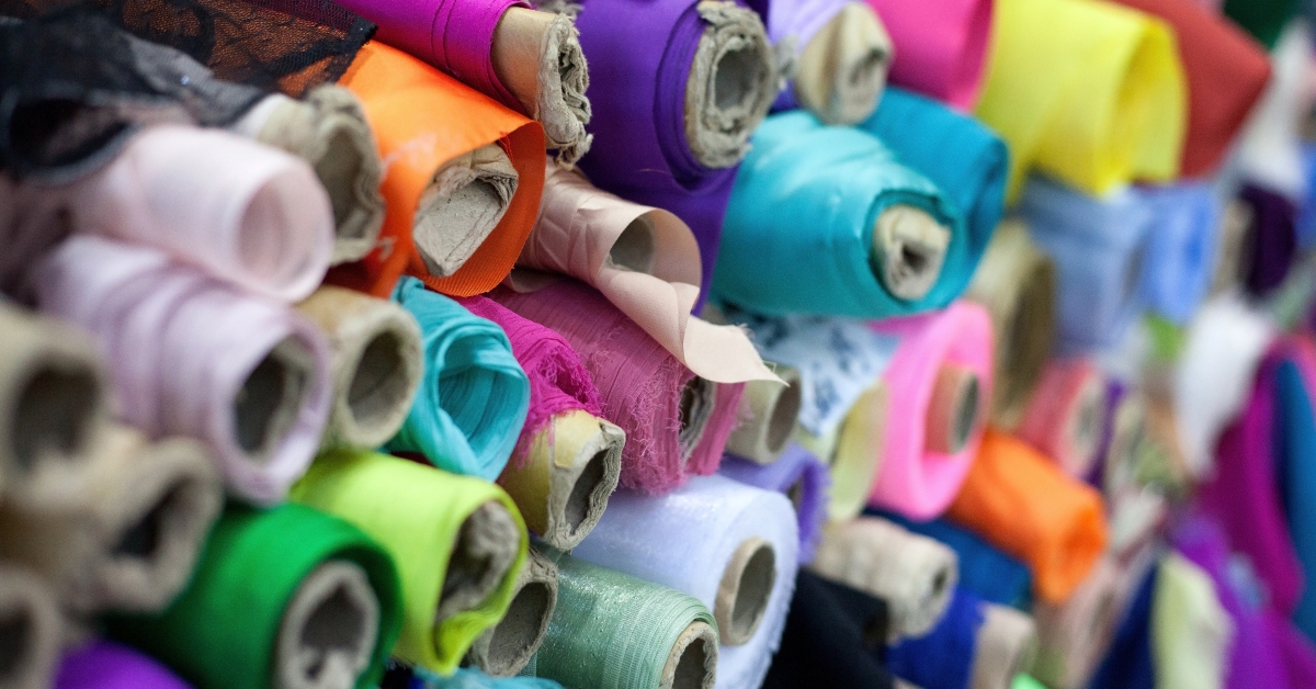 colorful rolls of textiles 