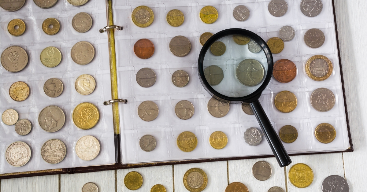 different coins in a numismatic album