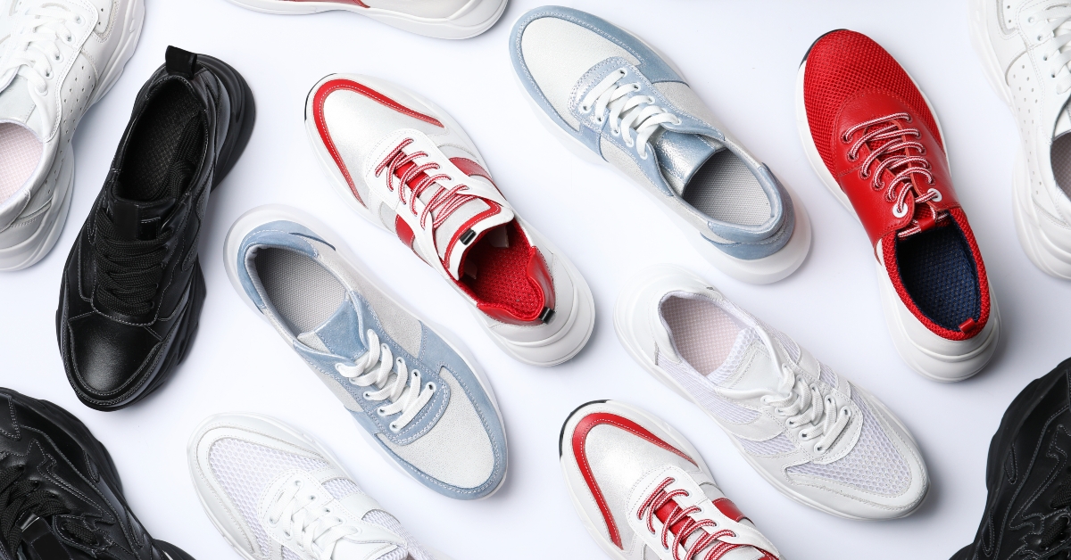 stylish sneakers on white background