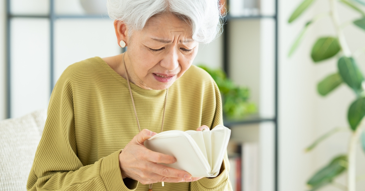 senior woman worried about money