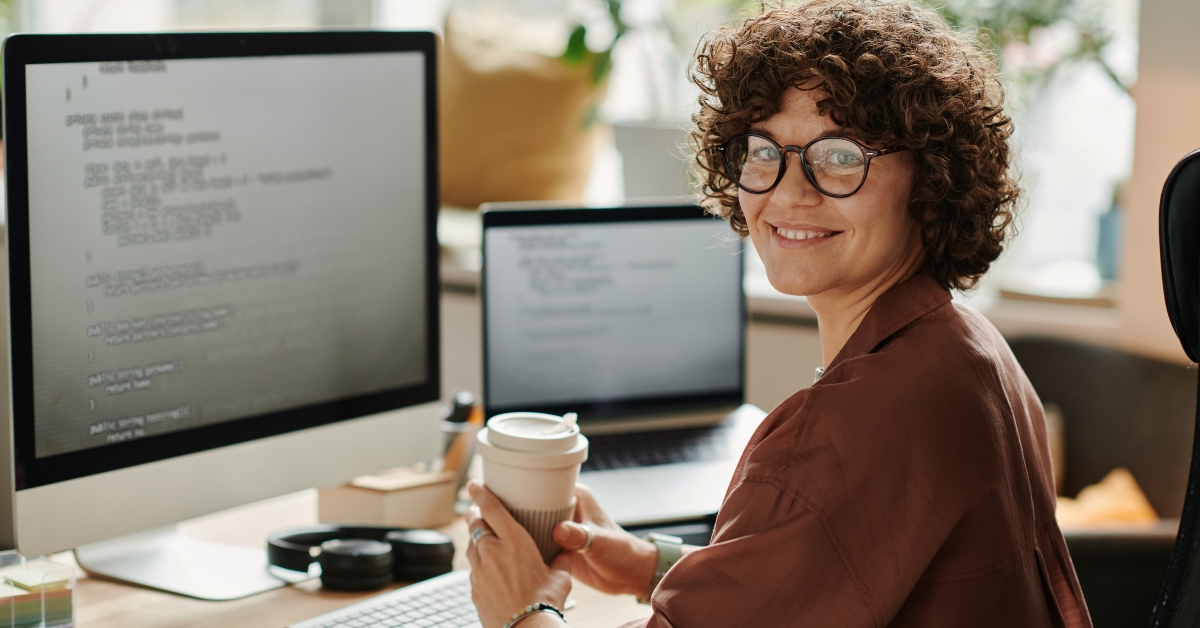 IT specialist with cup of coffee
