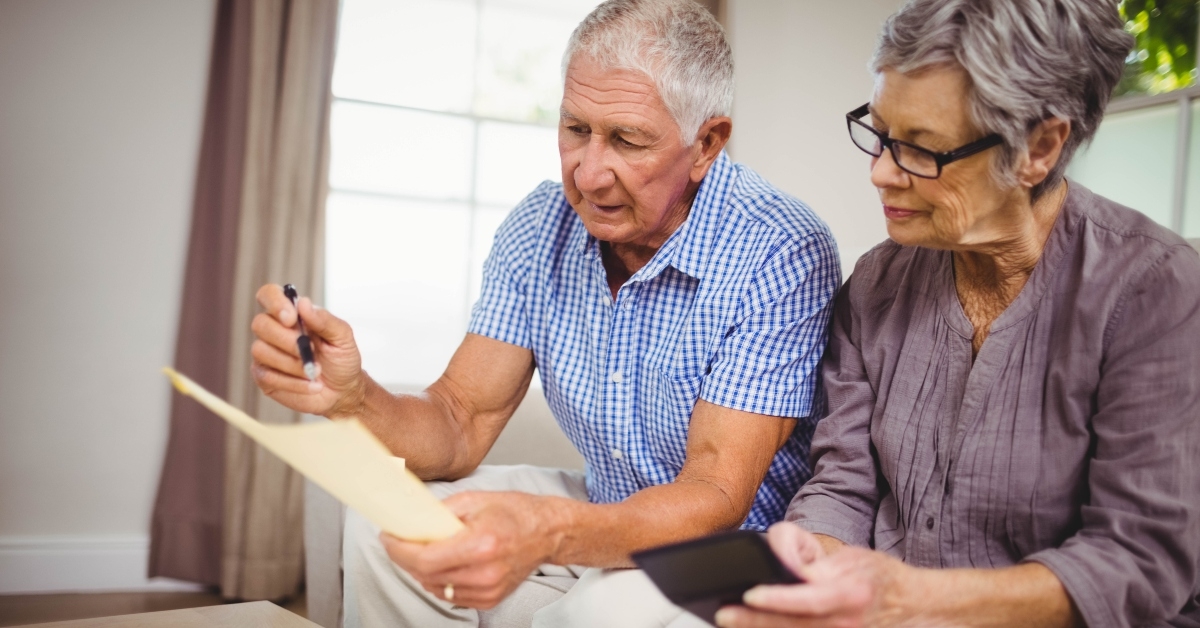 senior couple calculating bills