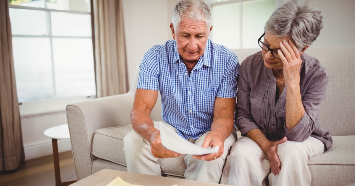 senior man showing documents