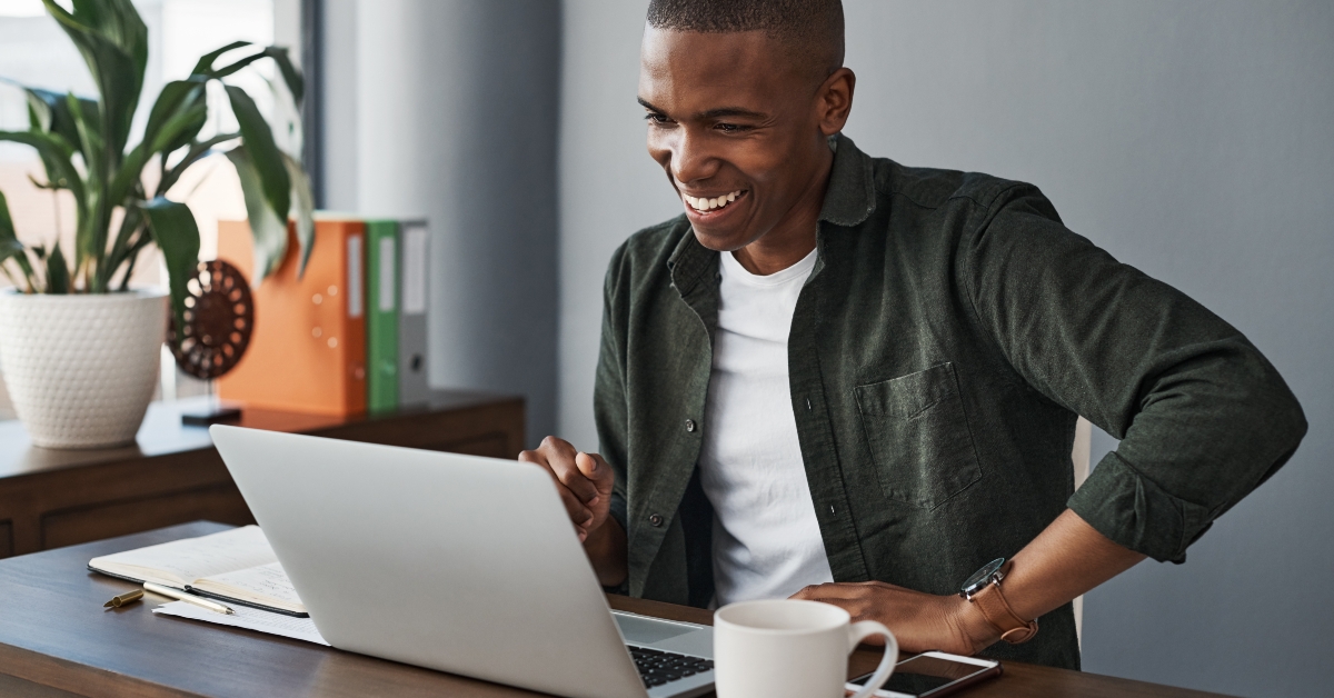 businessman using his laptop while working from home