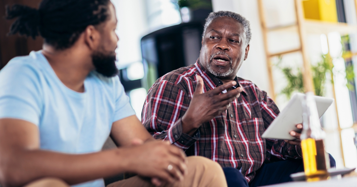father and son talking to each other