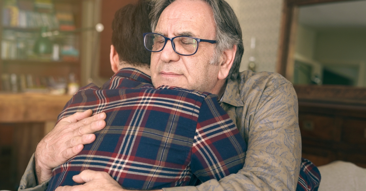  son embracing his father