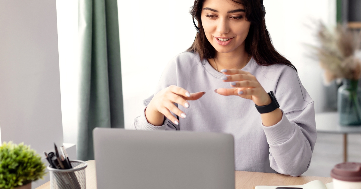 woman making virtual conference on laptop