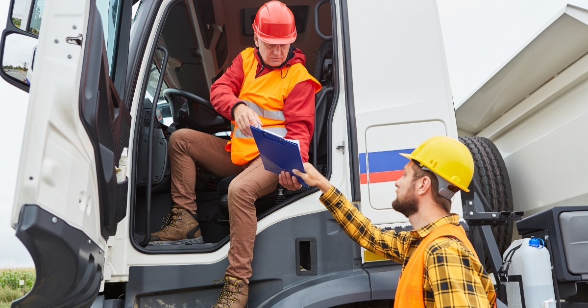 driver brings delivery to construction site