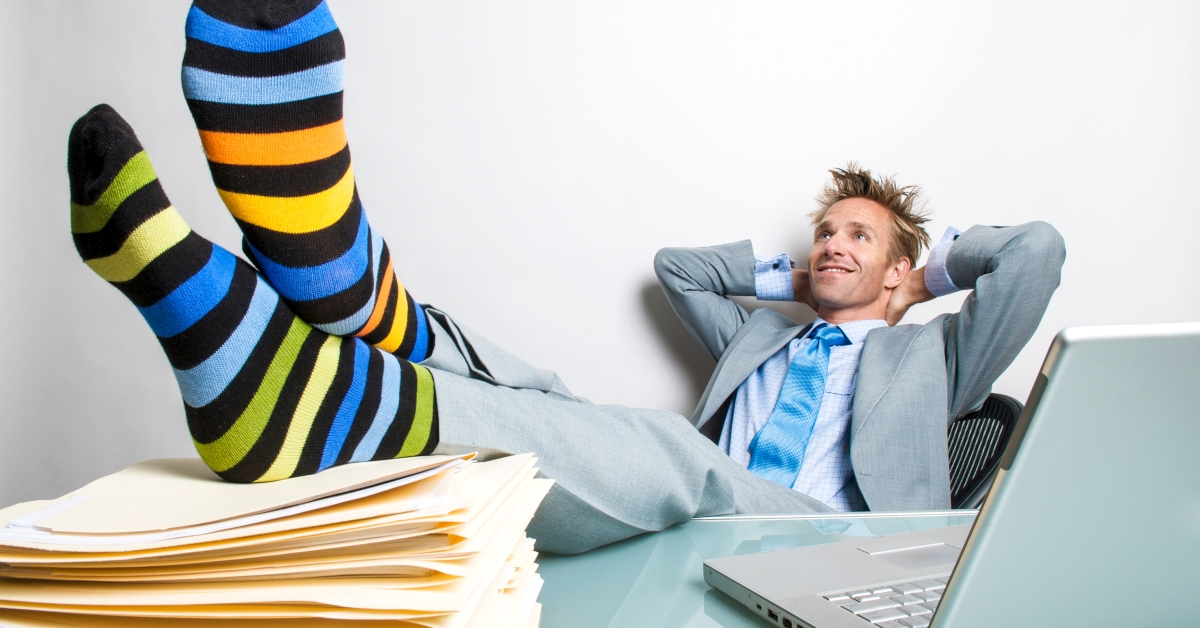 Satisfied businessman relaxing