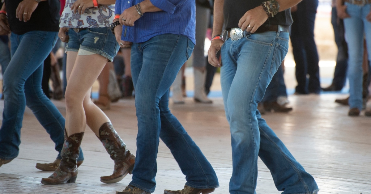 men and woman line dance