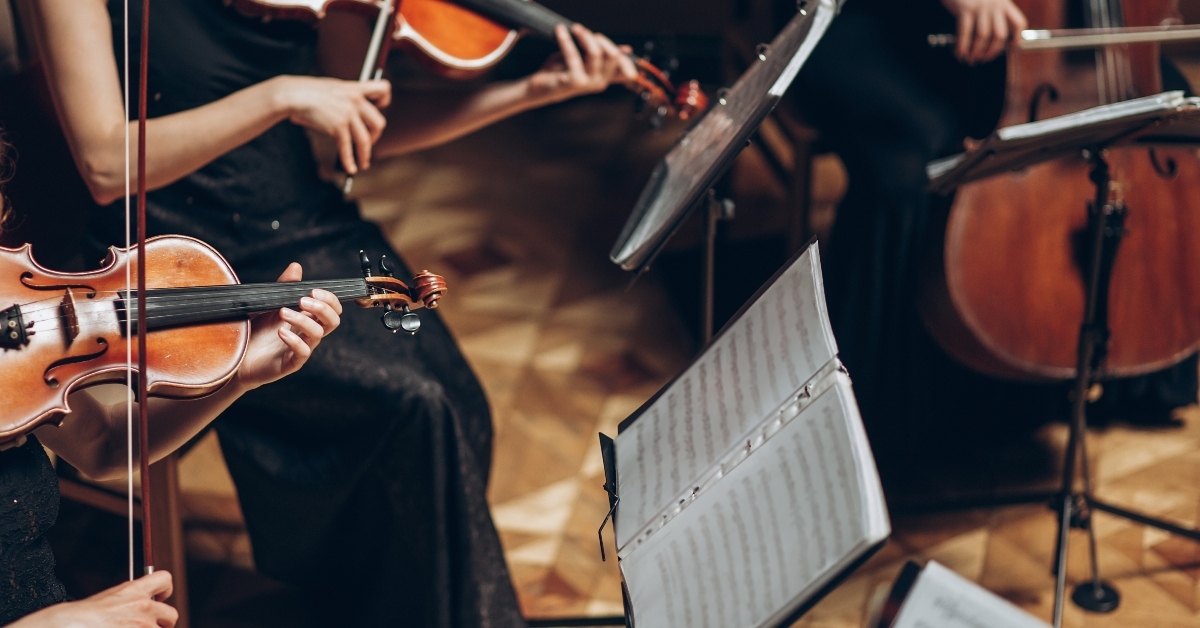 performing on violin and cello