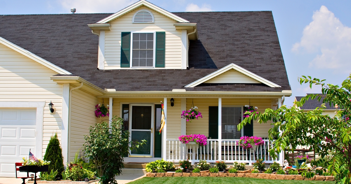 a white house with yard