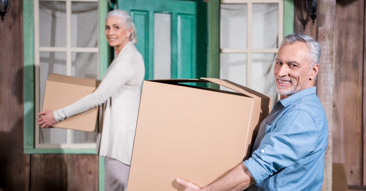 couple with cardboard boxes 