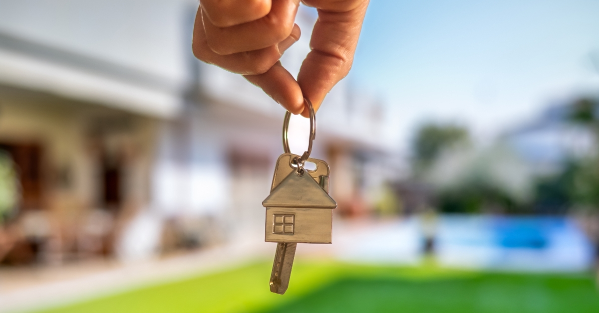 real estate agent holding house keys