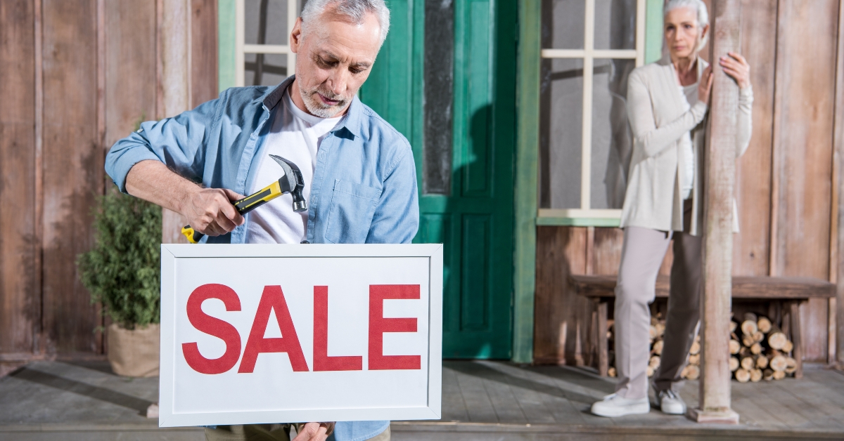 upset senior couple selling their house