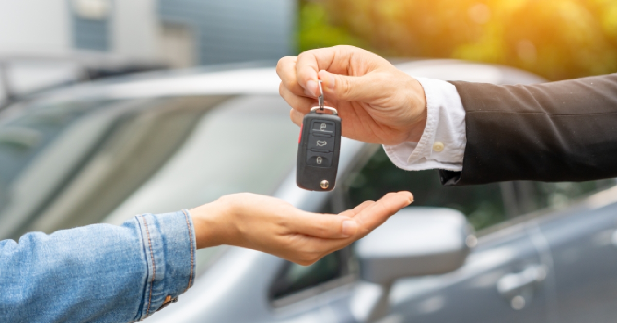 dealership manager send car keys to the new owner