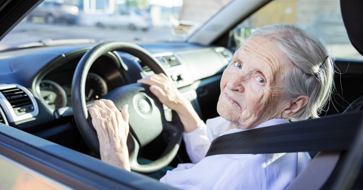 senior woman driving car