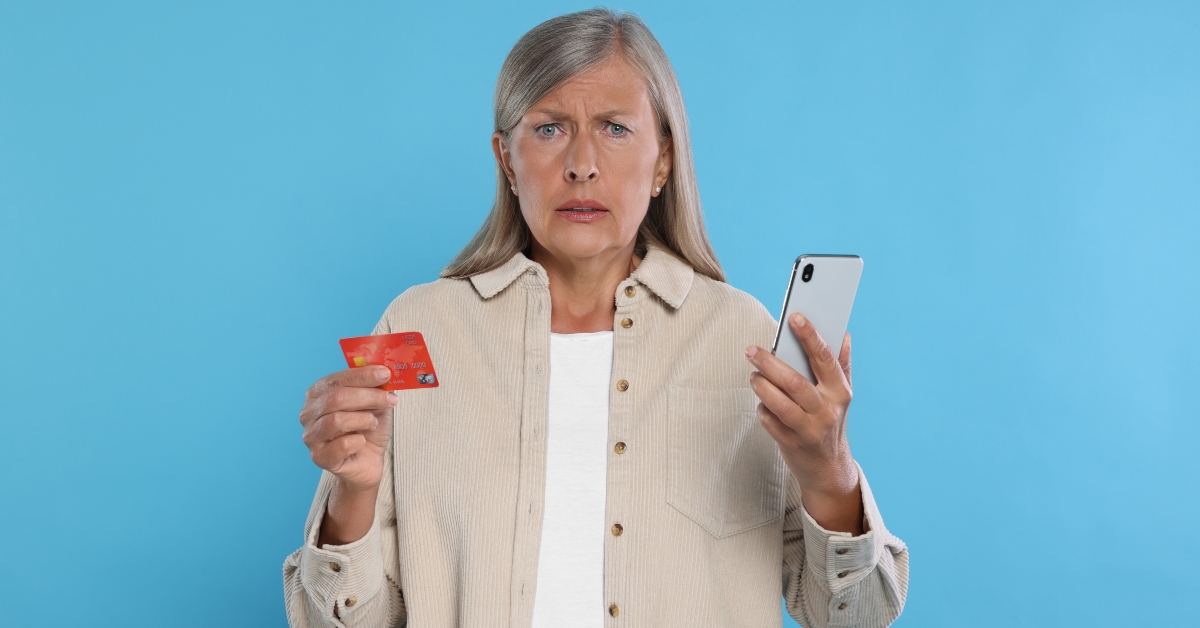 Worried woman with credit card
