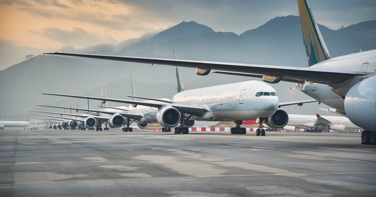airline fleet parked at the taxiway of airport