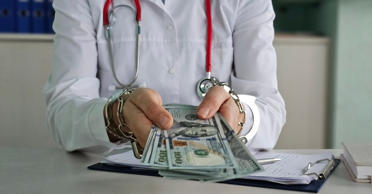 doctor with dollar bank notes