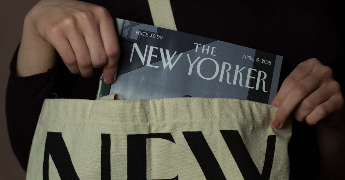 woman is taking out the new yorker magazine
