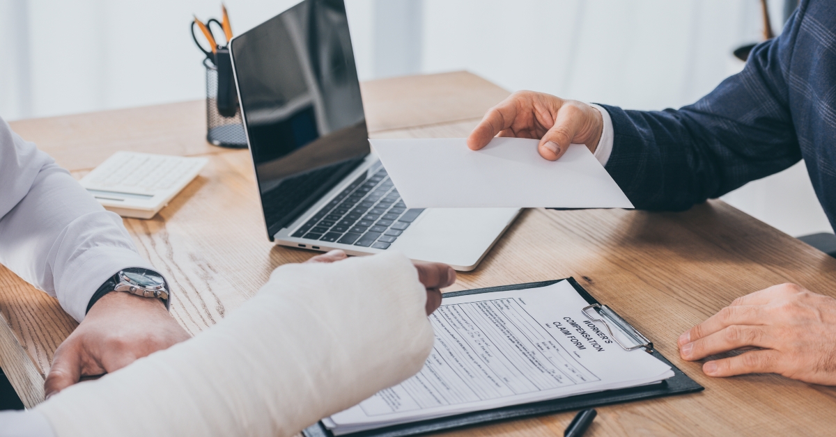 businessman-giving paper sheet to worker