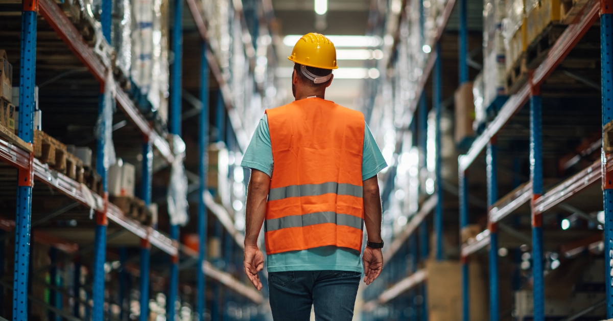 male worker walking at warehouse