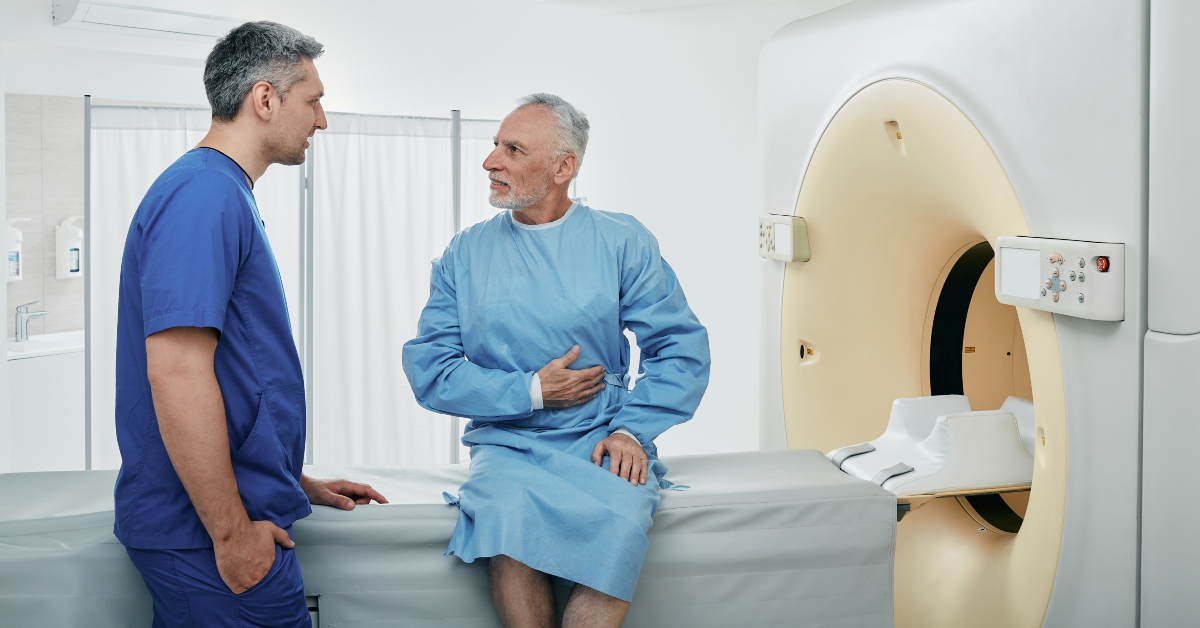senior patient's complaints sitting on CT scanner bed