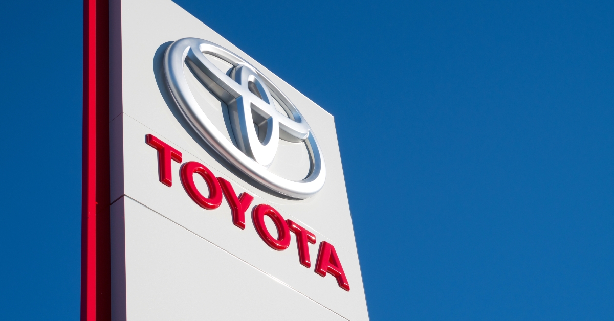 Toyota dealership sign against blue sky
