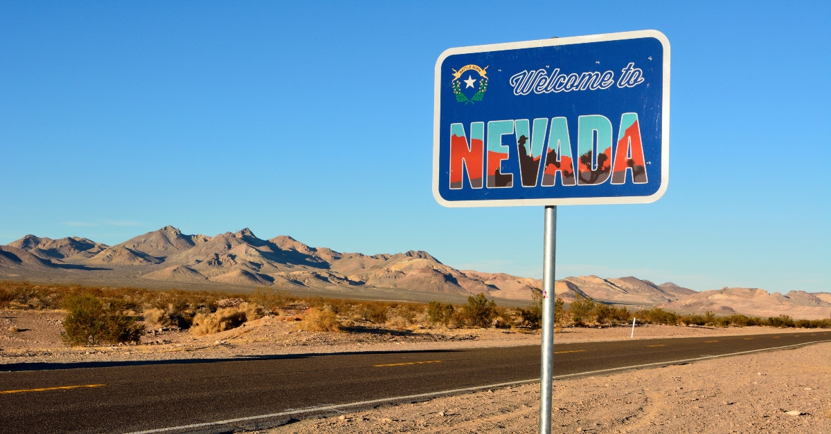 welcome to nevada road sign