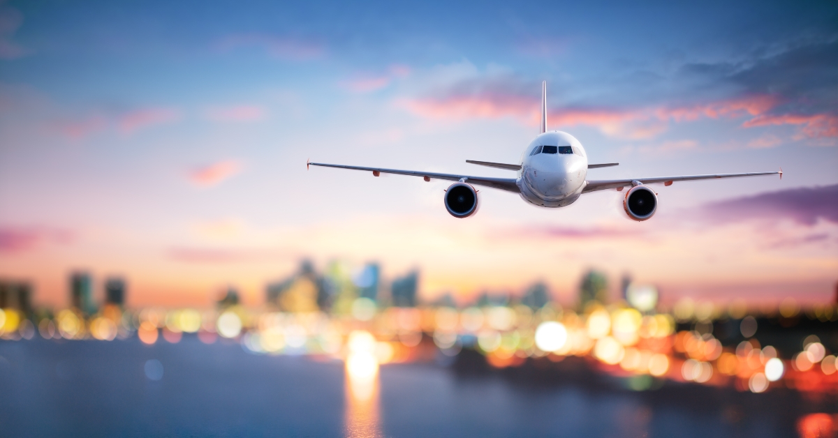 airplane in flight at twilight
