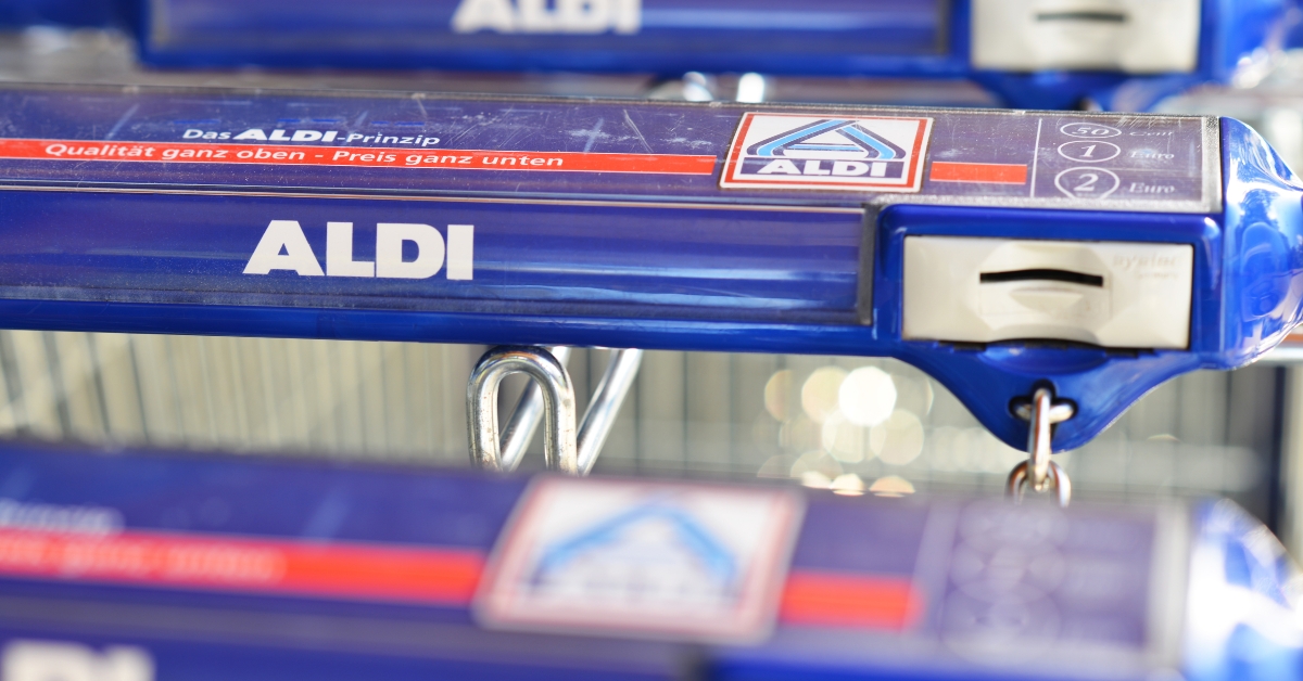 Handle of a shopping cart with the logo of ALDI