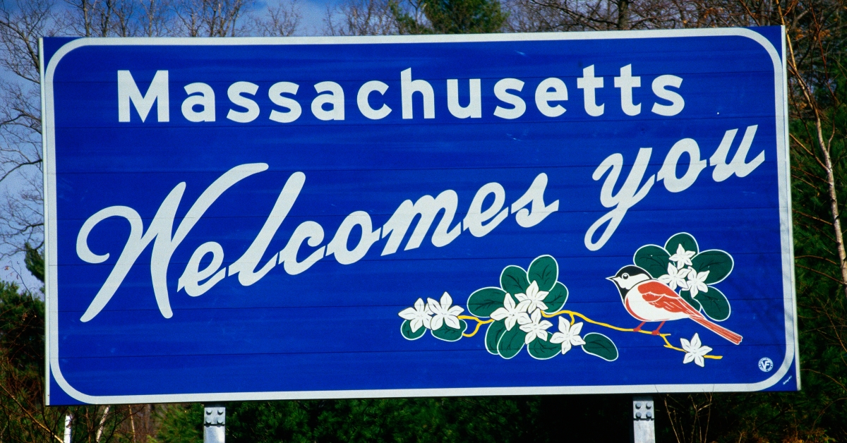 road sign that says Massachusetts welcomes you