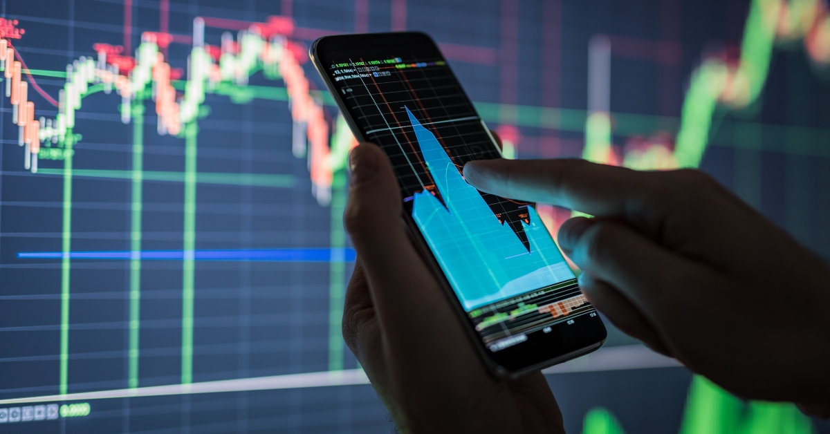 Businessman checking stock market data