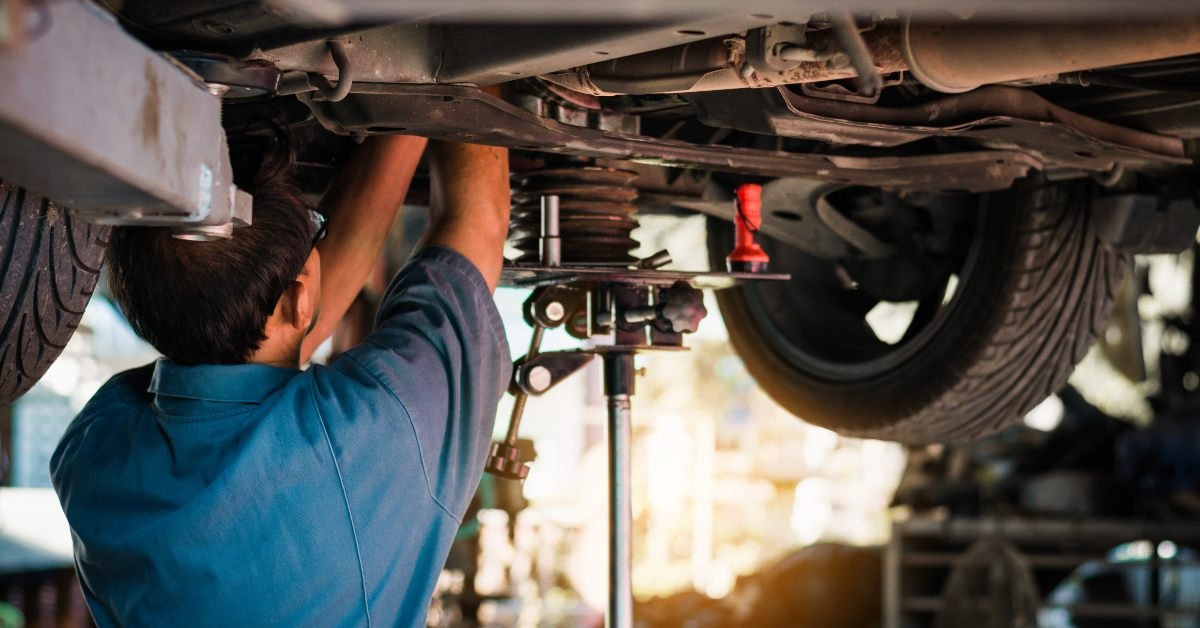 mechanic repairing a car
