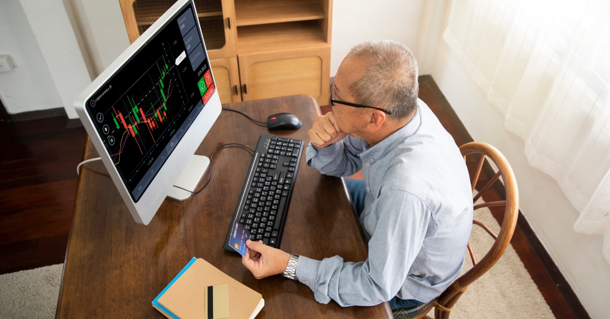 Senior asian man using computer
