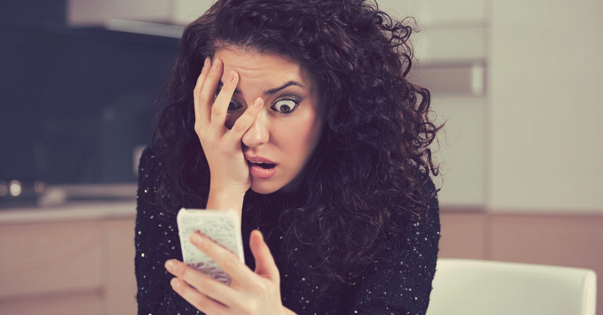 woman looking at phone