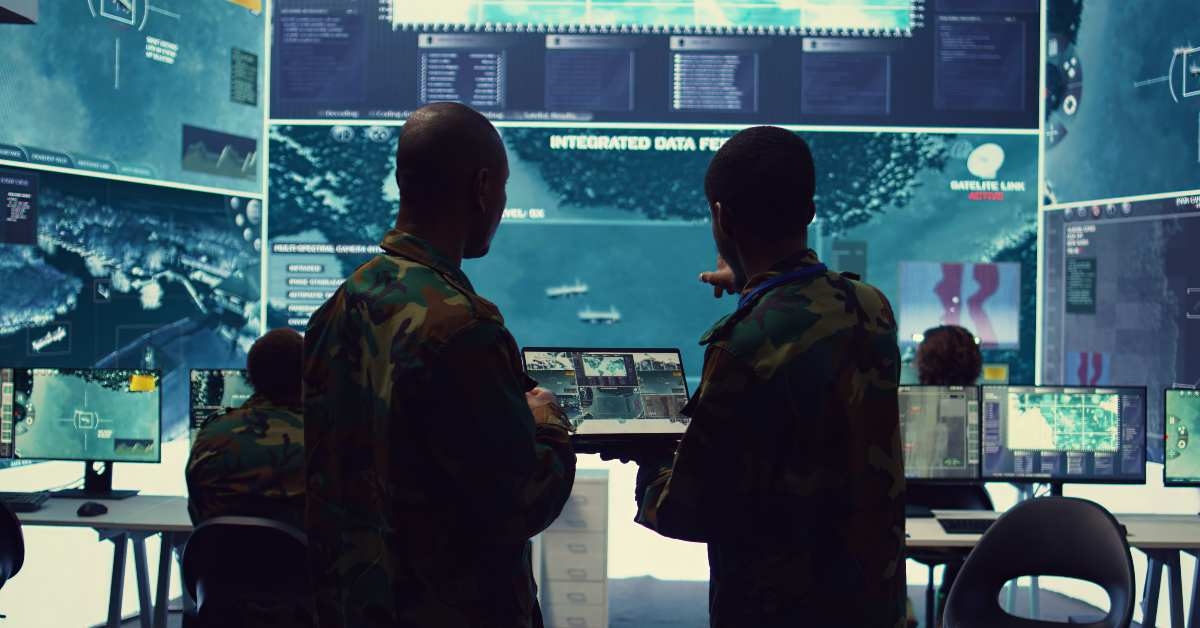 officers monitoring real time warfare information