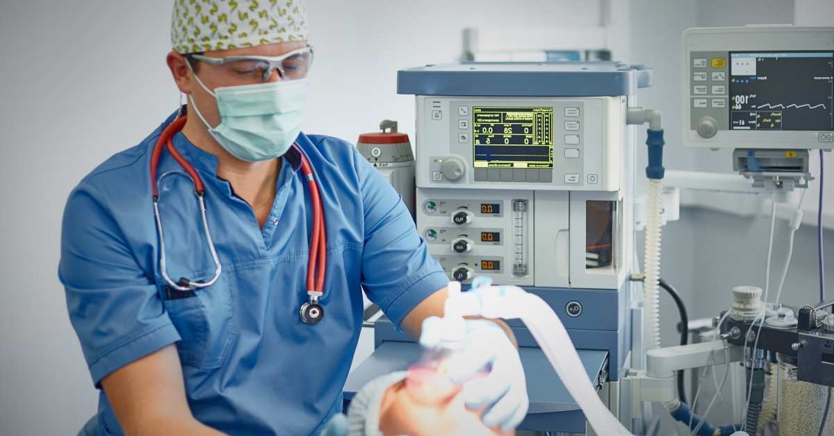 several doctors surrounding patient