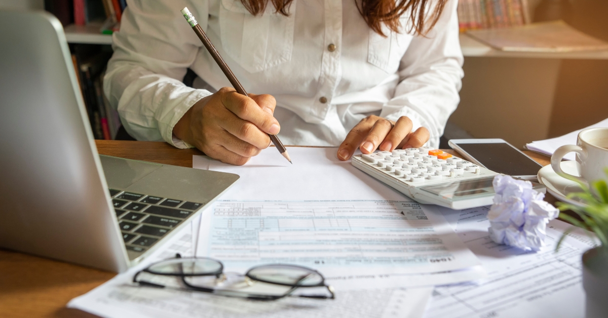 accountant is calculating companys annual tax