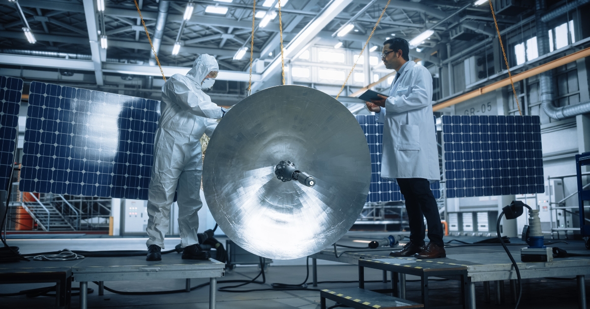 Team of Engineers Working on Satellite Construction