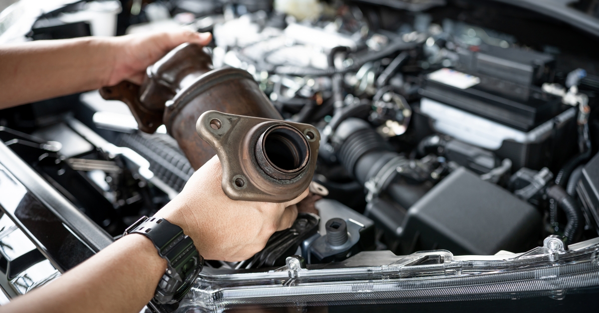 man remove old catalytic converter