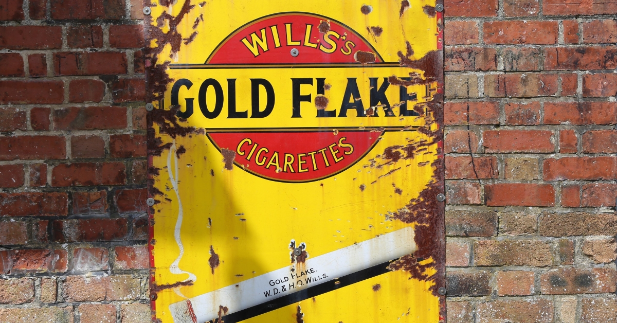 vintage metal advertising board