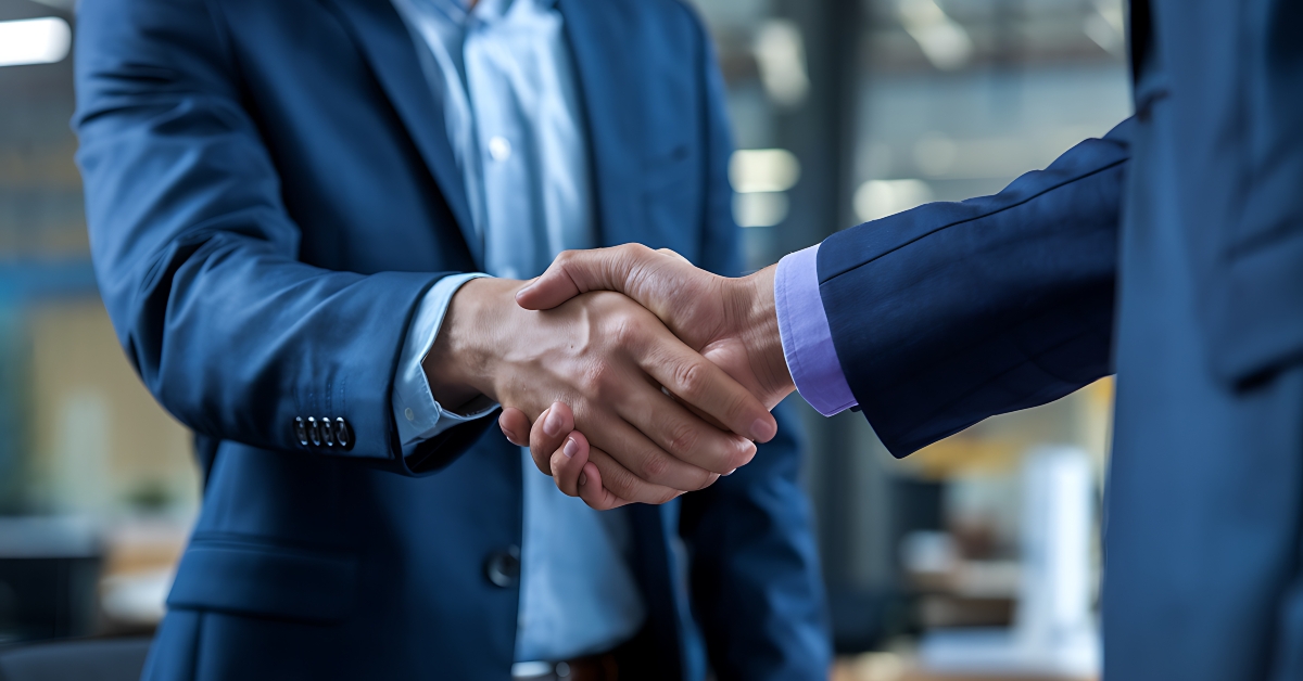 businessman handshakes for teamwork