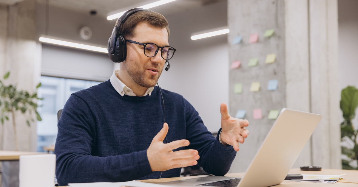 male worker communicating during video call