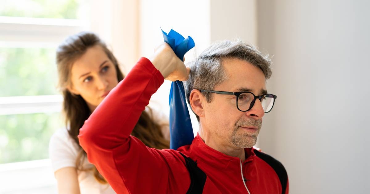 Man with occupational therapist